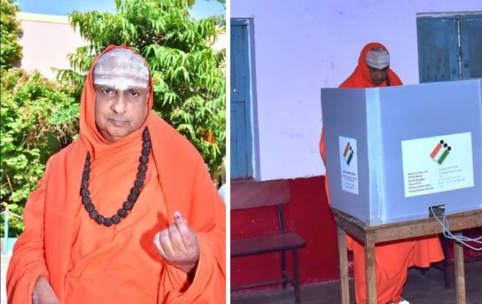 Civic Duty in Action: His Holiness Jagadguru Sri Shivarathri Deshikendra Mahaswamiji Casts His Vote in Suttur, Mysuru.